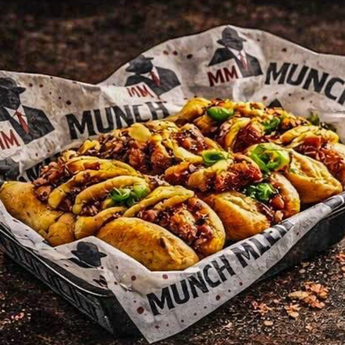 Topped Hot Dogs in a box served at Munch Mafia Takeaway in 
Greenock 